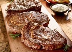 Kosher Boneless Rib Eye Steak with one Free Side Dish